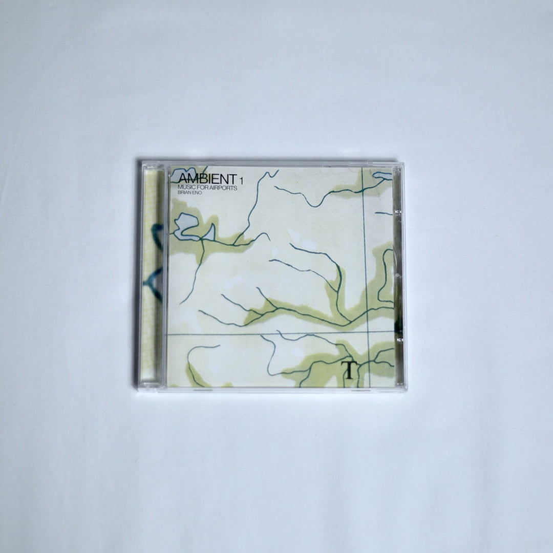 Brian Eno 'Ambient 1' music for airports CD on a white background