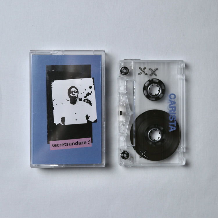 Carista cassette tape with a blue cover and visible branding on a light gray background