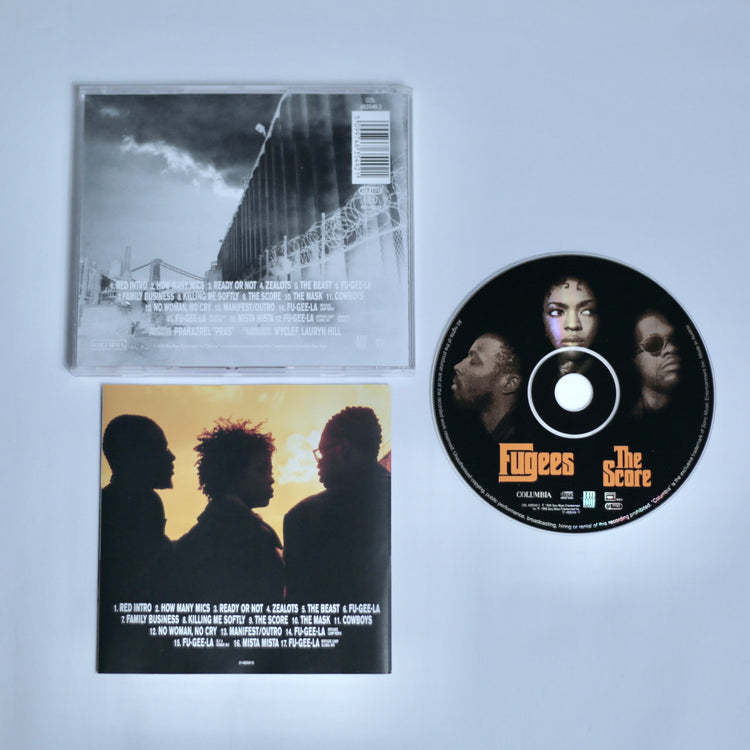 CD and cover of 'The Score' by Fugees on an off white background