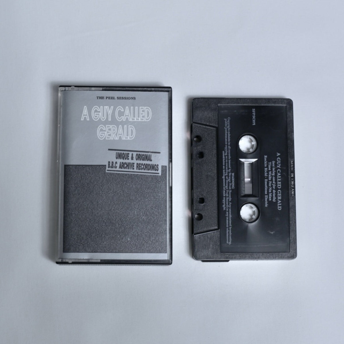 A Guy Called Gerald – The Peel Sessions cassette tape, grey inlay card with BBC Archive Recordings artwork, shown alongside the black cassette