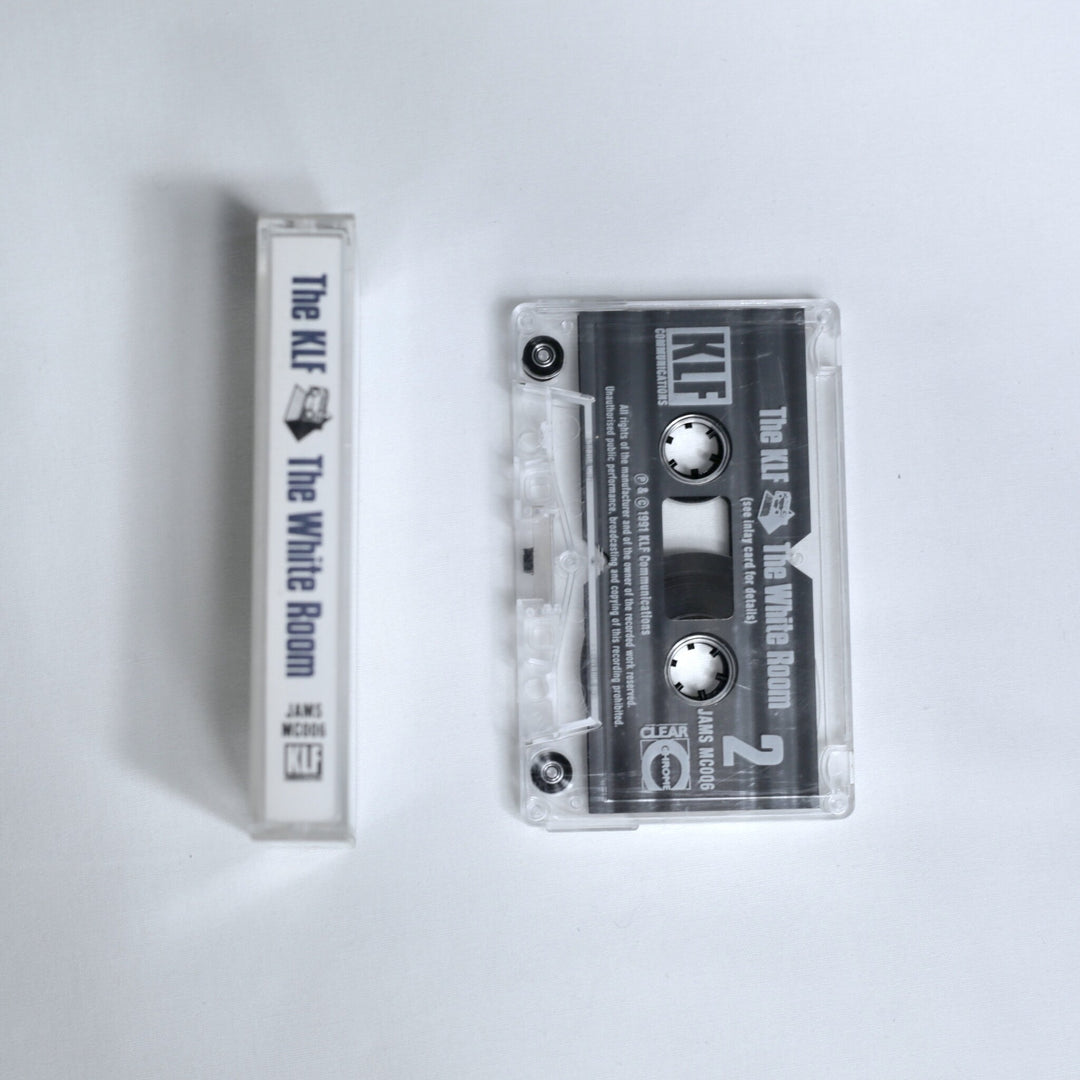 The KLF – The White Room cassette, spine view of the inlay card next to the cassette (Side 2)