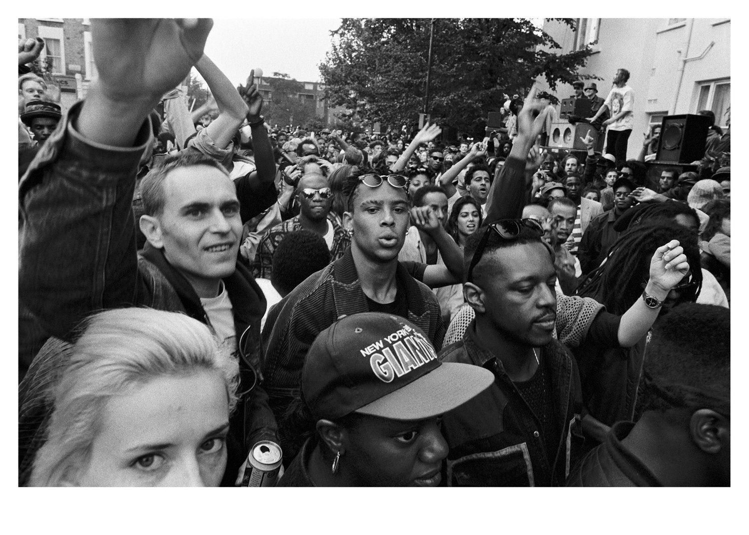 Black and white photo of a crowd at Notting Hill Carnival.