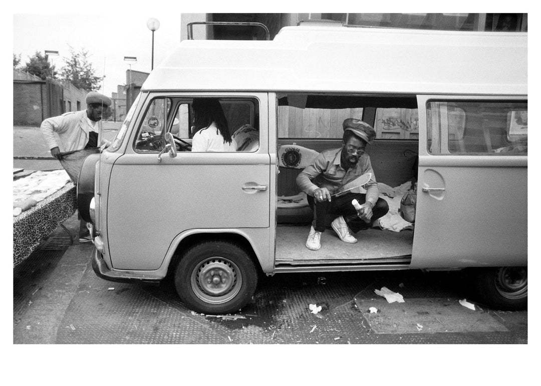 People in van parked in 1987 in Notting Hill