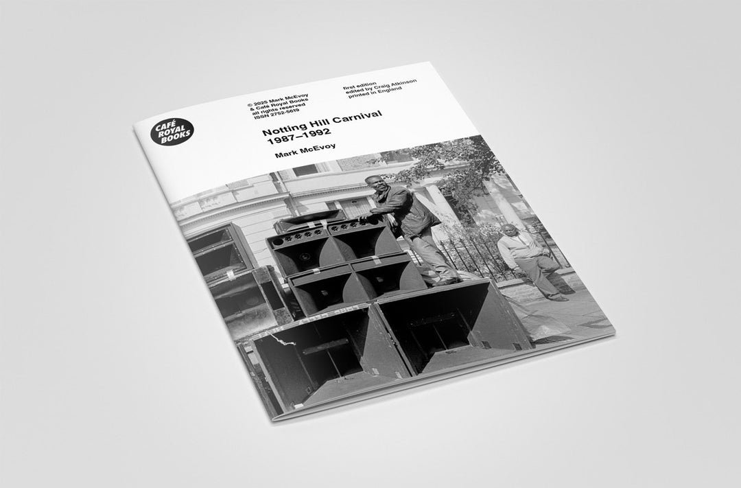 Photography book titled 'Notting Hill Carnival 1987-1992' with black and white photos on a gray background
