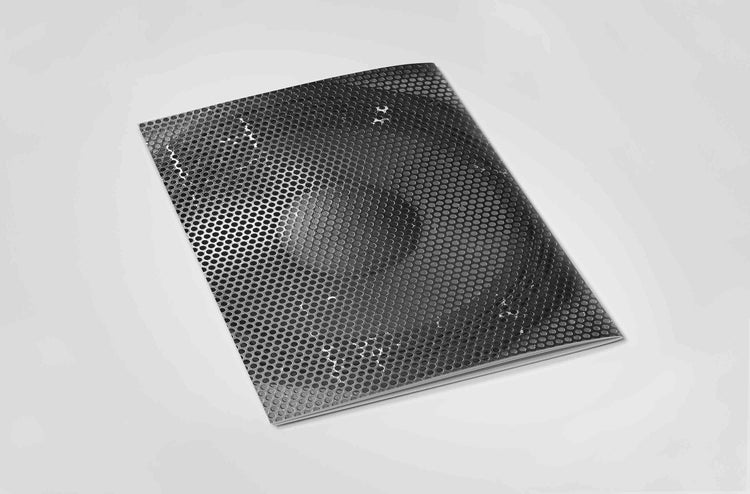 Back cover of black and white photography book with close up of speaker