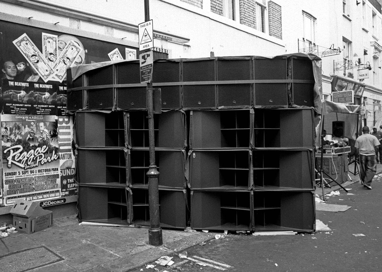 Sound system in Notting Hill, London with buildings and posters in the background.