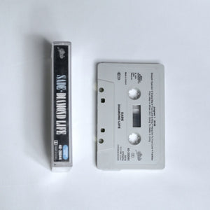 Sade – Diamond Life cassette tape spine, shown alongside the cassette 