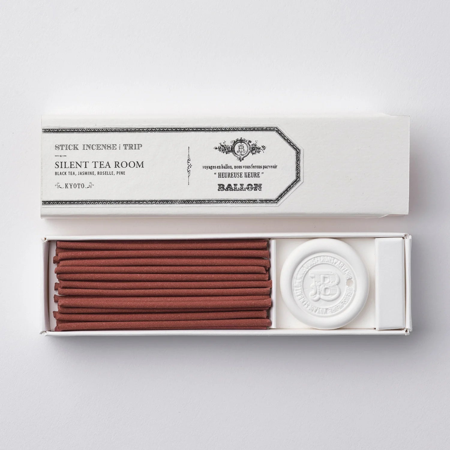 Incense sticks in a white box with a visible brand label on a light gray background