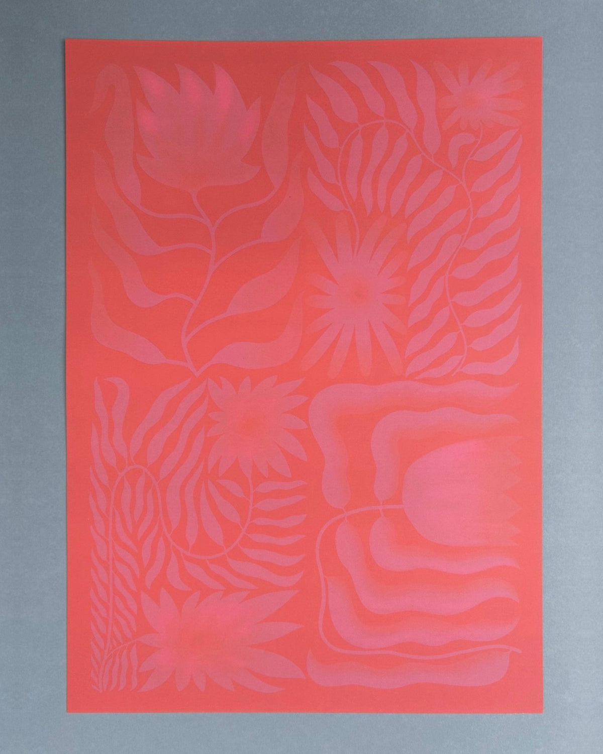 A rectangular coral pink art print featuring  floral and leaf pattern, displayed flat against a neutral gray background.