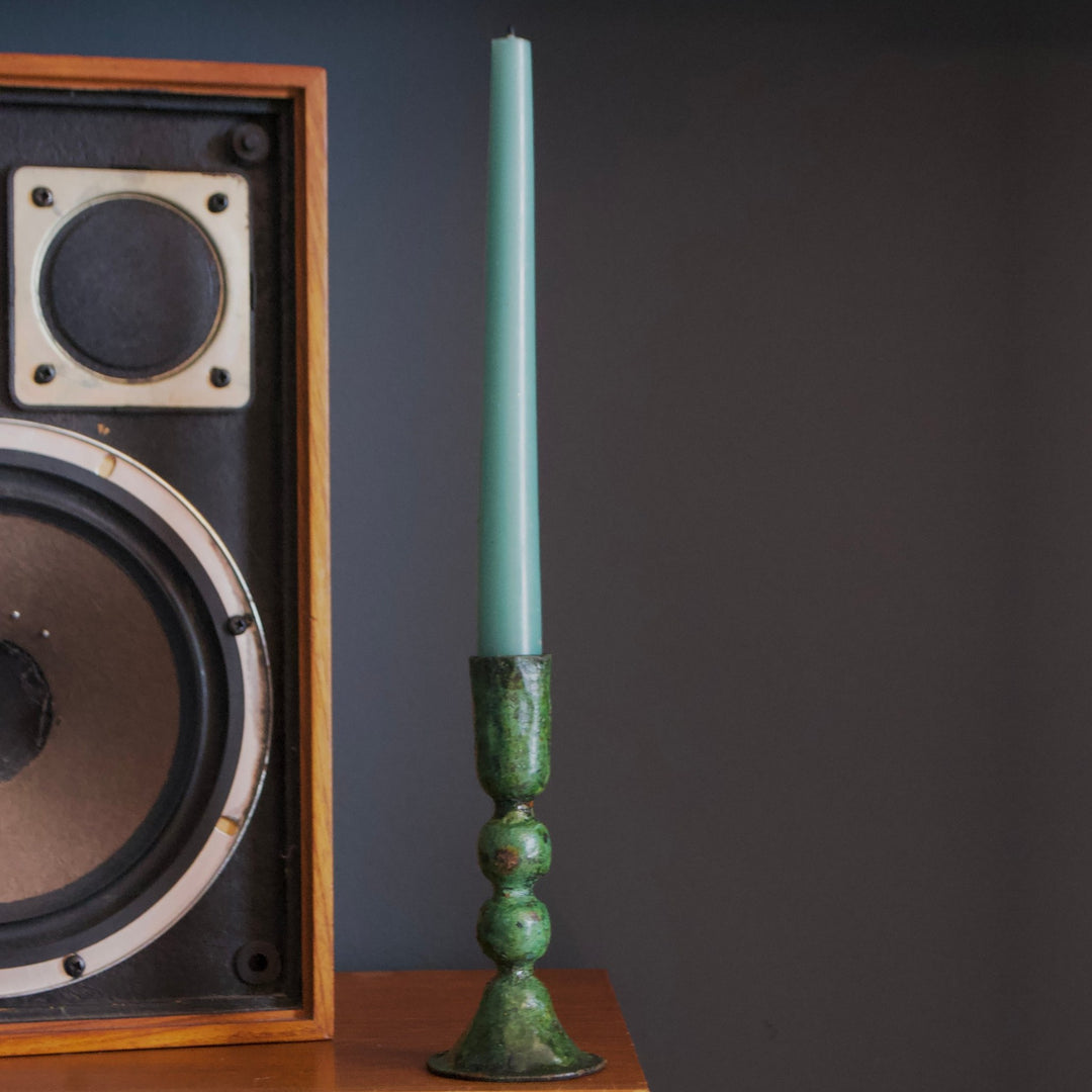 Tall verdigris candle holder