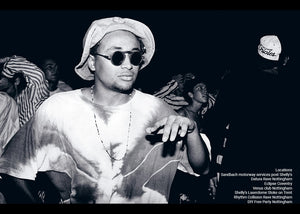 Black and white photo of a person wearing sunglasses and a hat on a dark background
