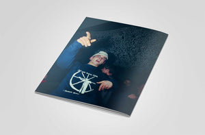 Back of book with a person wearing a blue shirt at a rave against a dark background